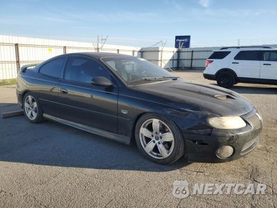 Czwarte zdjęcie samochodu z boku: 2006 PONTIAC GTO VIN:6G2VX12U56L828289 - miniatura