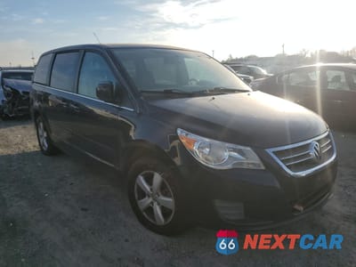 Czwarte zdjęcie samochodu z boku: 2010 VOLKSWAGEN ROUTAN SE VIN:2V4RW3D14AR406841 - miniatura