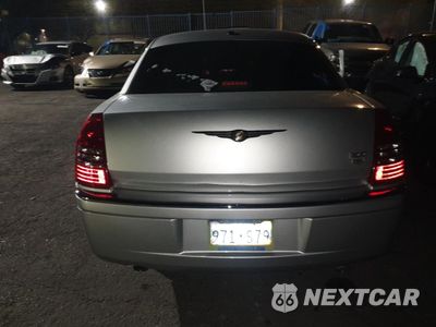 Zdjęcie 6 z 12 samochodu: 2006 CHRYSLER 300C VIN:2C3KA63H36H480201 - miniatura