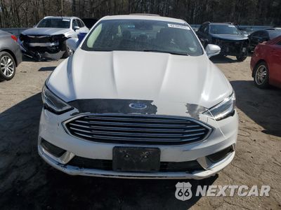 Piąte zdjęcie samochodu w środku: 2018 FORD FUSION SE HYBRID VIN:3FA6P0LU1JR118781 - miniatura