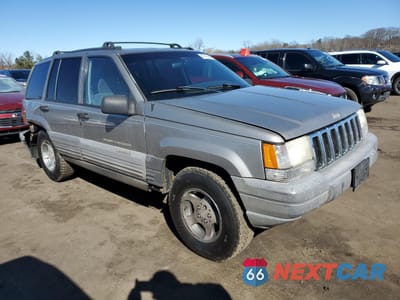 Czwarte zdjęcie samochodu z boku: 1998 JEEP GRAND CHEROKEE LAREDO VIN:1J4GZ58SXWC243159 - miniatura
