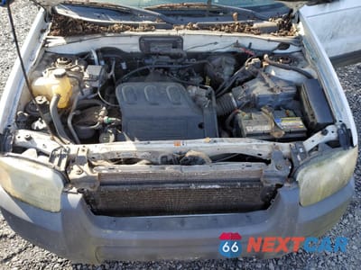 Zdjęcie 12 z 14 samochodu: 2003 FORD ESCAPE XLT VIN:1FMYU03153KC15034 - miniatura