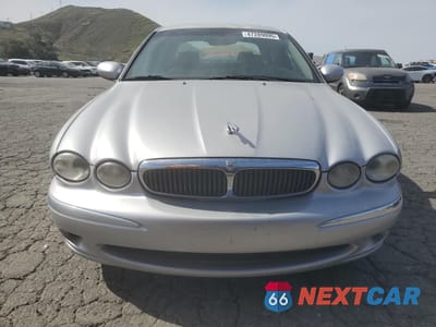 Piąte zdjęcie samochodu w środku: 2003 JAGUAR X-TYPE 2.5 VIN:SAJEA51DX3XD48180 - miniatura
