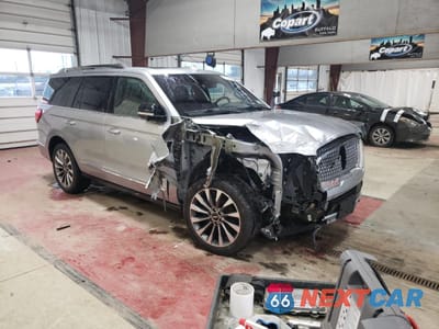 Czwarte zdjęcie samochodu z boku: 2020 LINCOLN NAVIGATOR RESERVE VIN:5LMJJ2LT6LEL17168 - miniatura