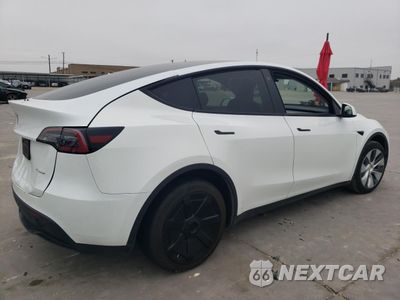 Trzecie zdjęcie samochodu z tyłu: 2023 TESLA MODEL Y VIN:7SAYGDEE6PA078787 - miniatura