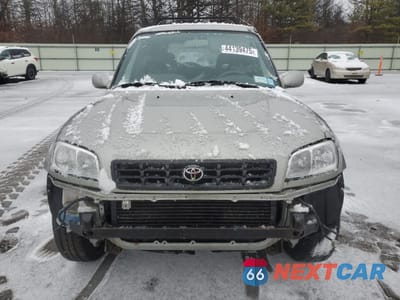 Piąte zdjęcie samochodu w środku: 1999 TOYOTA RAV4 VIN:JT3GP10V8X7049397 - miniatura