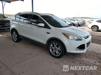 Czwarte zdjęcie samochodu z boku: 2016 FORD ESCAPE TITANIUM VIN:1FMCU0JX7GUA39681 - miniatura