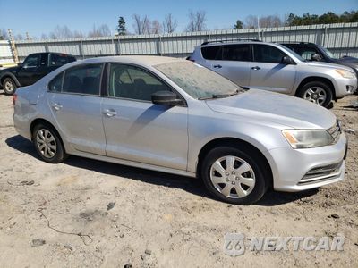 Czwarte zdjęcie samochodu z boku: 2015 VOLKSWAGEN JETTA BASE VIN:3VW1K7AJ9FM301223 - miniatura