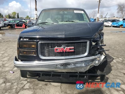 Piąte zdjęcie samochodu w środku: 1996 GMC SUBURBAN K1500 VIN:1GDFK16R3TJ749952 - miniatura