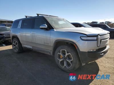 Czwarte zdjęcie samochodu z boku: 2023 RIVIAN R1S ADVENTURE VIN:7PDSGABA2PN021129 - miniatura