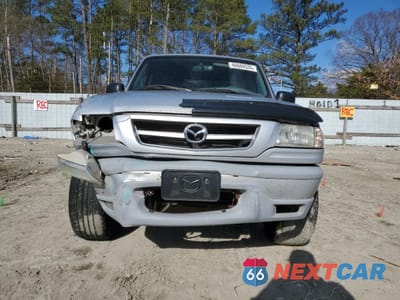 Piąte zdjęcie samochodu w środku: 2002 MAZDA B3000 CAB PLUS VIN:4F4YR16U72TM16130 - miniatura