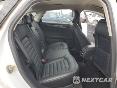 Zdjęcie 10 z 12 samochodu: 2017 FORD FUSION SE HYBRID VIN:3FA6P0LU0HR359676 - miniatura