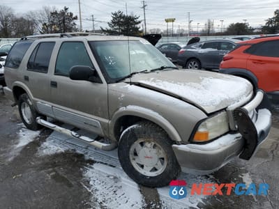 Czwarte zdjęcie samochodu z boku: 2000 GMC JIMMY VIN:1GKCS13W2Y2291635 - miniatura