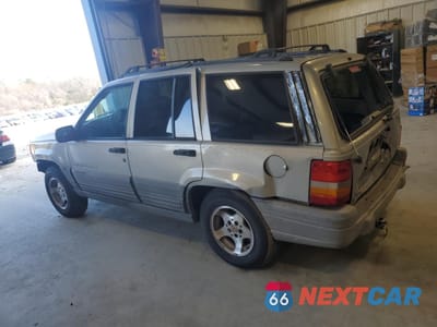 Drugie zdjęcie samochodu z przodu: 1997 JEEP GRAND CHEROKEE LAREDO VIN:1J4FX58S0VC770823 - miniatura