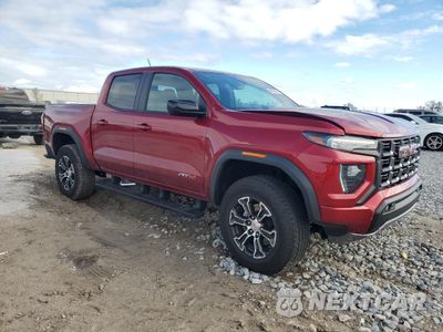 Czwarte zdjęcie samochodu z boku: 2024 GMC CANYON AT4 VIN:1GTP6DEK5R1174250 - miniatura