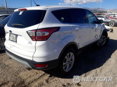 Trzecie zdjęcie samochodu z tyłu: 2017 FORD ESCAPE SE VIN:1FMCU9GD4HUC96350 - miniatura