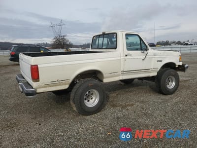 Trzecie zdjęcie samochodu z tyłu: 1990 FORD F150 VIN:2FTEF14Y1LCA87124 - miniatura