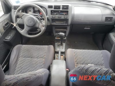 Zdjęcie 8 z 16 samochodu: 1999 TOYOTA RAV4 VIN:JT3GP10V8X7049397 - miniatura