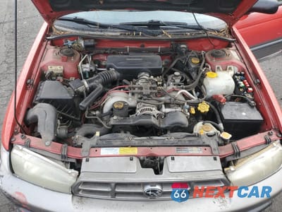 Zdjęcie 12 z 13 samochodu: 1999 SUBARU LEGACY OUTBACK VIN:4S3BG6853X7606482 - miniatura