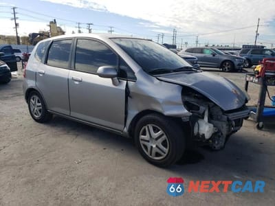 Czwarte zdjęcie samochodu z boku: 2007 HONDA FIT VIN:JHMGD38447S064664 - miniatura