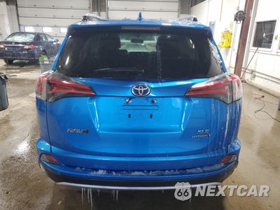 Zdjęcie 6 z 16 samochodu: 2016 TOYOTA RAV4 HV XLE VIN:JTMRJREV8GD055537 - miniatura
