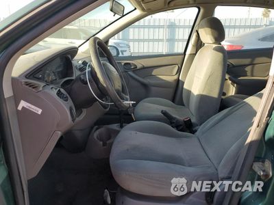 Zdjęcie 7 z 12 samochodu: 2000 FORD FOCUS LX VIN:1FAFP33P3YW215712 - miniatura