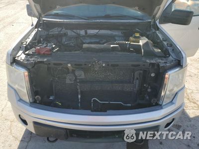 Zdjęcie 12 z 13 samochodu: 2014 FORD F150 VIN:1FTMF1EF8EFB97099 - miniatura