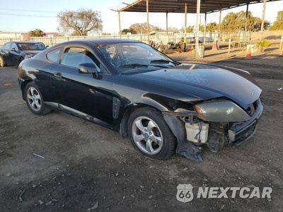 Czwarte zdjęcie samochodu z boku: 2005 HYUNDAI TIBURON VIN:KMHHM65D25U176369 - miniatura