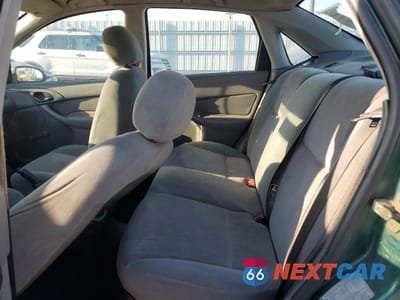 Zdjęcie 10 z 12 samochodu: 2000 FORD FOCUS LX VIN:1FAFP33P3YW215712 - miniatura