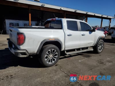 Trzecie zdjęcie samochodu z tyłu: 2024 GMC CANYON DENALI VIN:1GTP6FEK7R1261773 - miniatura
