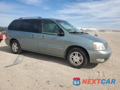 Czwarte zdjęcie samochodu z boku: 2007 FORD FREESTAR SEL VIN:2FMZA52227BA10808 - miniatura