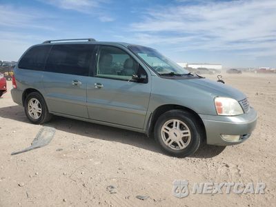 Czwarte zdjęcie samochodu z boku: 2007 FORD FREESTAR SEL VIN:2FMZA52227BA10808 - miniatura