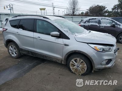 Czwarte zdjęcie samochodu z boku: 2017 FORD ESCAPE SE VIN:1FMCU9GDXHUC63823 - miniatura