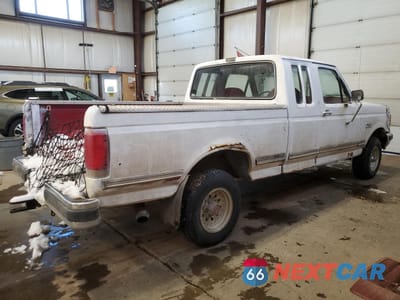 Trzecie zdjęcie samochodu z tyłu: 1991 FORD F150 VIN:1FTEX14N7MKA09821 - miniatura