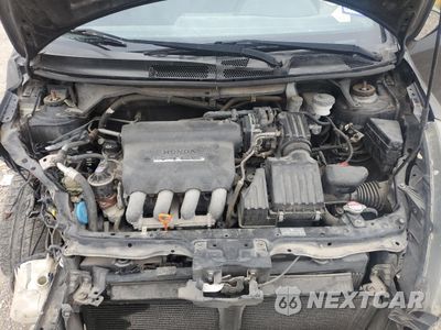 Zdjęcie 13 z 15 samochodu: 2007 HONDA FIT VIN:JHMGD37437S061658 - miniatura