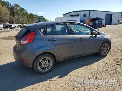 Trzecie zdjęcie samochodu z tyłu: 2018 FORD FIESTA SE VIN:3FADP4EJ4JM101228 - miniatura