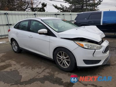 Czwarte zdjęcie samochodu z boku: 2017 FORD FOCUS SE VIN:1FADP3F29HL224813 - miniatura
