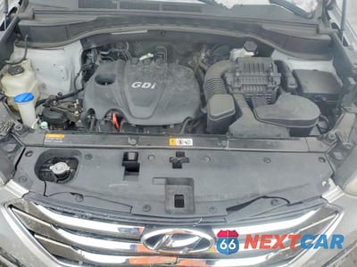 Zdjęcie 12 z 13 samochodu: 2013 HYUNDAI SANTA FE SPORT 2.4L VIN:5XYZTDLB4DG062858 - miniatura