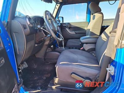 Zdjęcie 7 z 13 samochodu: 2016 JEEP WRANGLER SPORT VIN:1C4AJWAG2GL165802 - miniatura