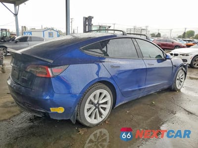 Trzecie zdjęcie samochodu z tyłu: 2021 TESLA MODEL 3 VIN:5YJ3E1EA7MF029377 - miniatura