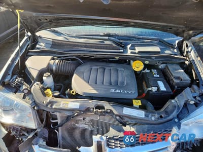 Zdjęcie 12 z 13 samochodu: 2018 DODGE GRAND CARAVAN VIN:2C4RDGCG0JR266557 - miniatura