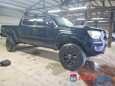 Czwarte zdjęcie samochodu z boku: 2014 TOYOTA TACOMA DOUBLE CAB VIN:3TMLU4EN5EM161297 - miniatura