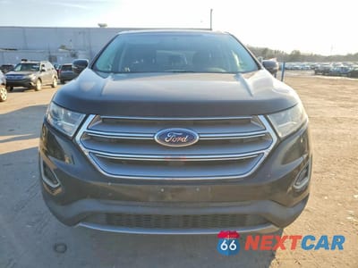 Piąte zdjęcie samochodu w środku: 2016 FORD EDGE TITANIUM VIN:2FMPK3K96GBB13364 - miniatura