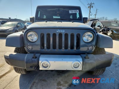 Piąte zdjęcie samochodu w środku: 2014 JEEP WRANGLER UNLIMITED SAHARA VIN:1C4BJWEG0EL196980 - miniatura