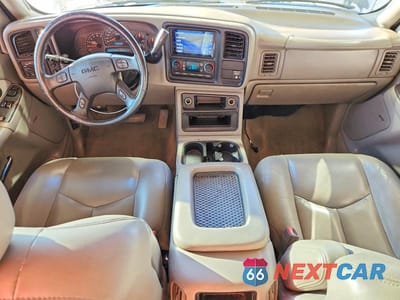 Zdjęcie 8 z 14 samochodu: 2003 GMC NEW SIERRA K1500 VIN:1GTEK19T23Z243344 - miniatura