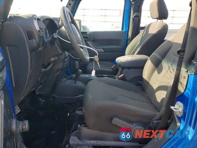 Zdjęcie 7 z 12 samochodu: 2016 JEEP WRANGLER SPORT VIN:1C4AJWAG3GL300656 - miniatura