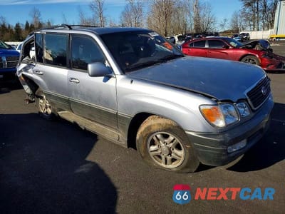 Czwarte zdjęcie samochodu z boku: 2001 LEXUS LX 470 VIN:JTJHT00W613501440 - miniatura