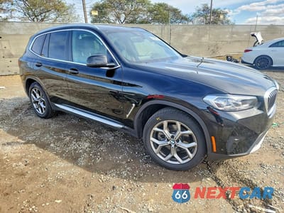 Czwarte zdjęcie samochodu z boku: 2024 BMW X3 SDRIVE30I VIN:5UX43DP08R9W10872 - miniatura