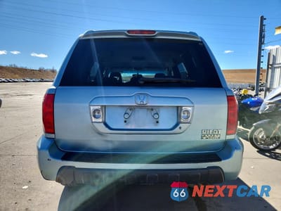 Zdjęcie 6 z 14 samochodu: 2003 HONDA PILOT EXL VIN:2HKYF18663H513972 - miniatura