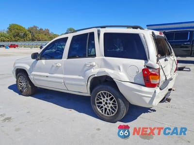 Drugie zdjęcie samochodu z przodu: 2003 JEEP GRAND CHEROKEE LIMITED VIN:1J4GW58N93C594434 - miniatura